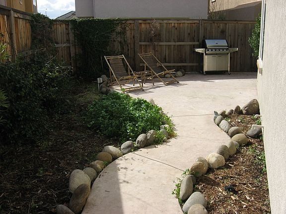 Spacious backyard with stamped concrete patio!