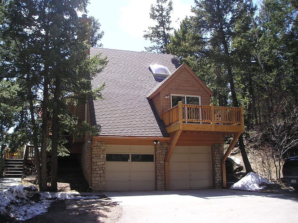 Front of house to left.