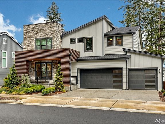 Front of house - with 3 car garage