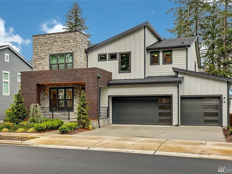 Front of house - with 3 car garage