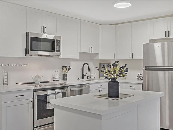 2nd image of 9780 N Belfort Cir #105