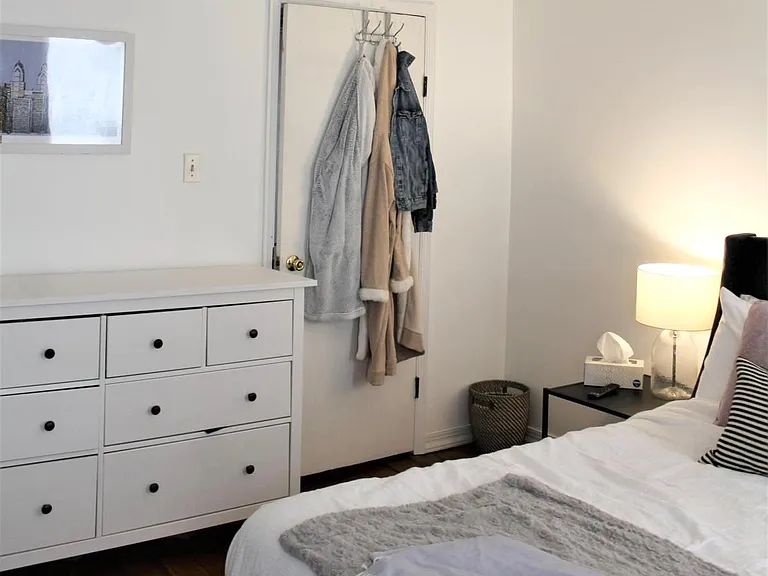 Large 2nd floor bedroom facing hallway