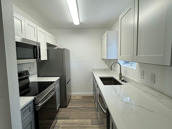 Renovated Kitchen, Quartz and Stainless Steel Appliances