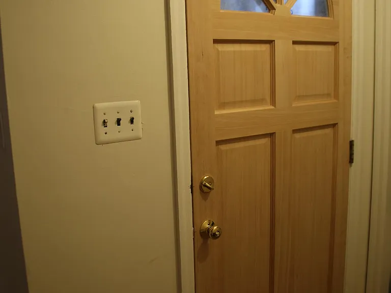 Main Entrance door with large in wall closet on the right side