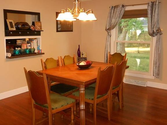 Formal dining room with large window + custom shade!