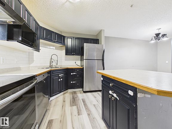 5th image of 16221 95th St NW #102