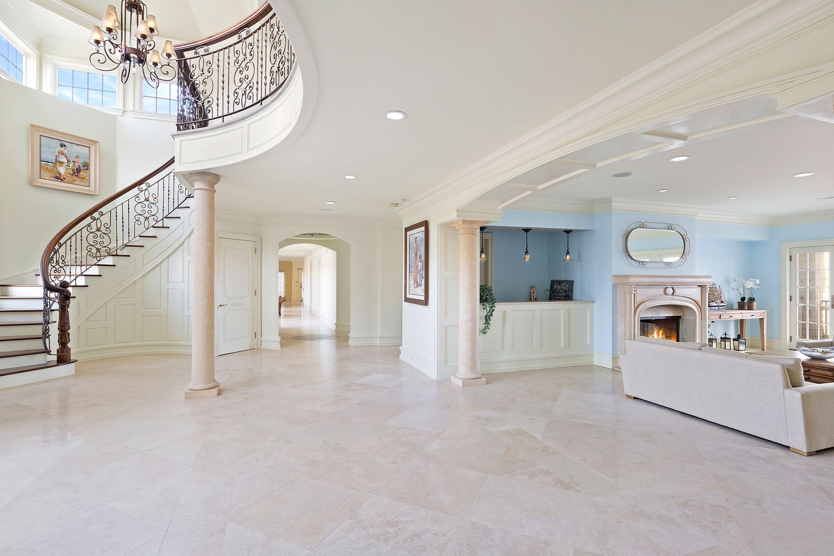  Entrance Foyer with Spiral Staircase, imported Marble Floors Throughout