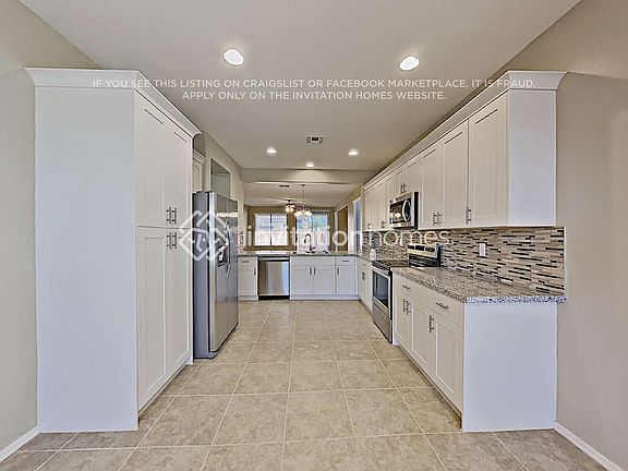 5th image of 15206 W Port Royale Ln