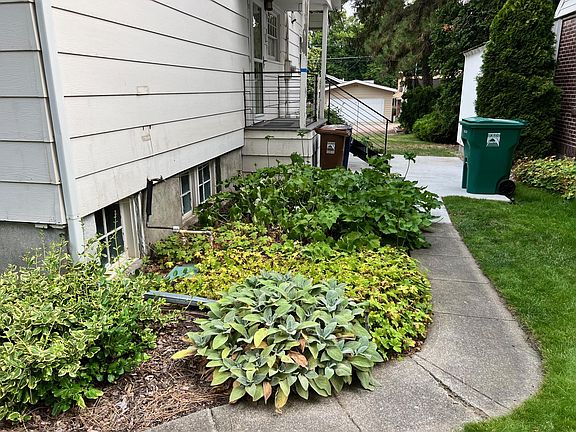 Exterior, east side of home looking north towards back door and back yard