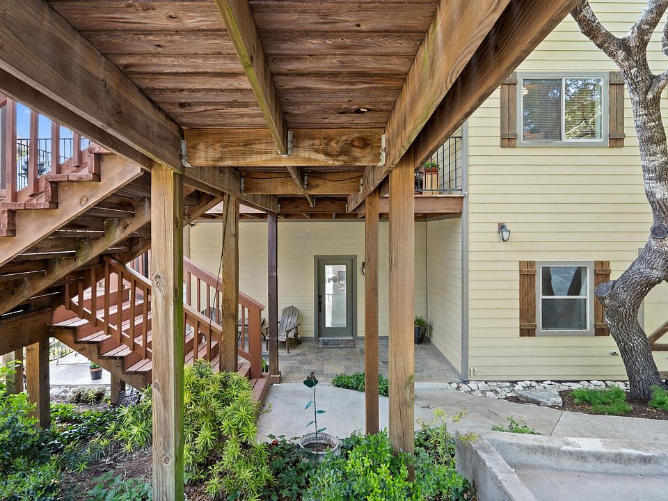 Multiple private entrances for the B unit. Garage, front door, side patio door, and lowest level patio door.