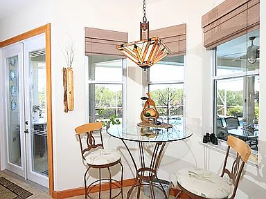 655 ne emerson st...Kitchen nook, Off of this room is a private pool table, with electric dartboard, and t v