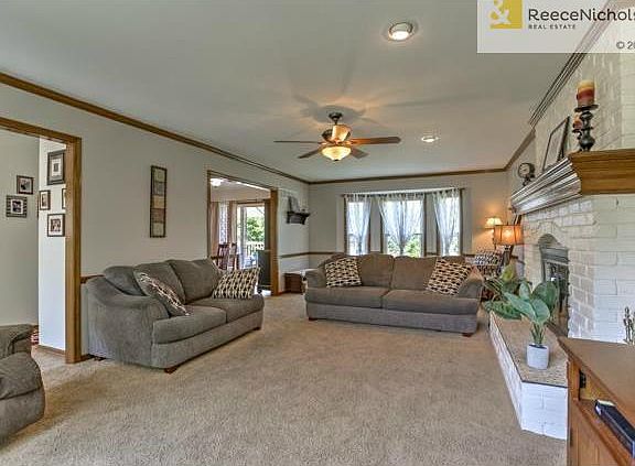 Large and inviting family room, opens to entry, along with dinin
