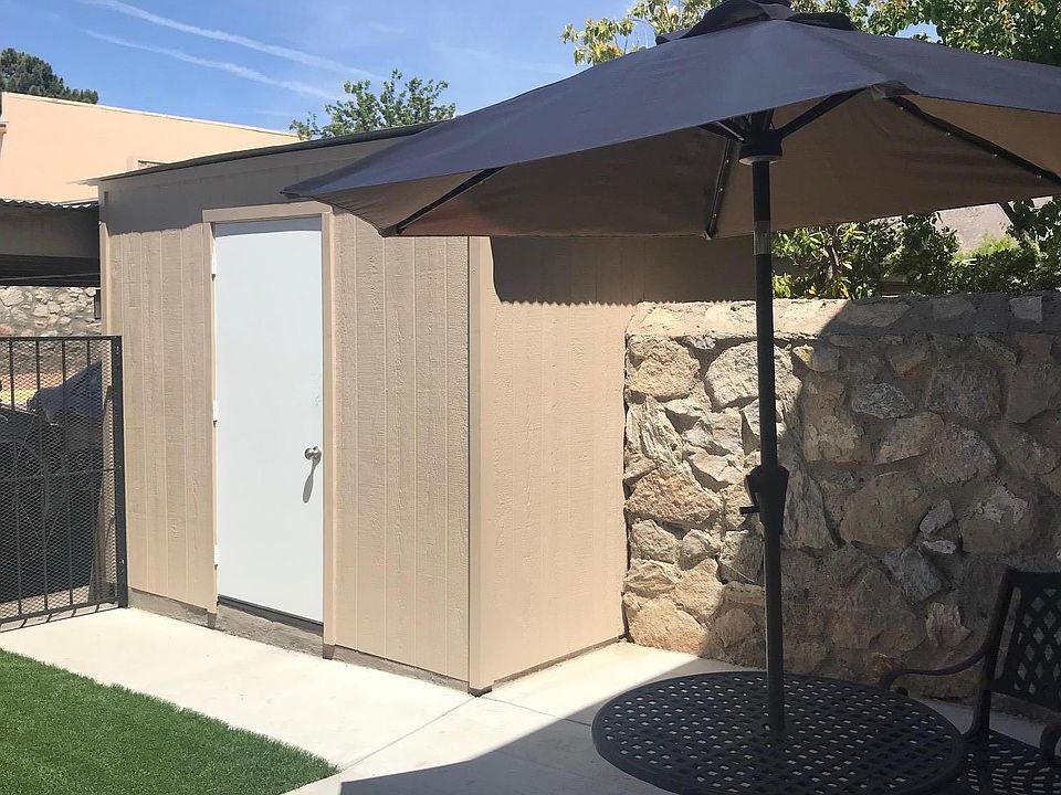Back Patio with storage unit. Artificial Grass. No Maintenance.