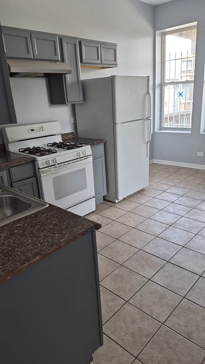 Building Photo - 1515 S Millard Ave #2R