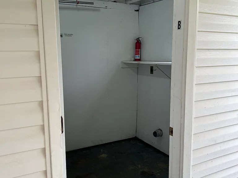 Washer Dryer hookups in Utility Room located under carport
