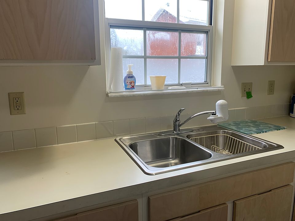 Double kitchen sink with disposal.