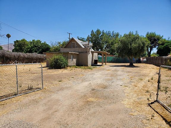 Large fenced yard with gate