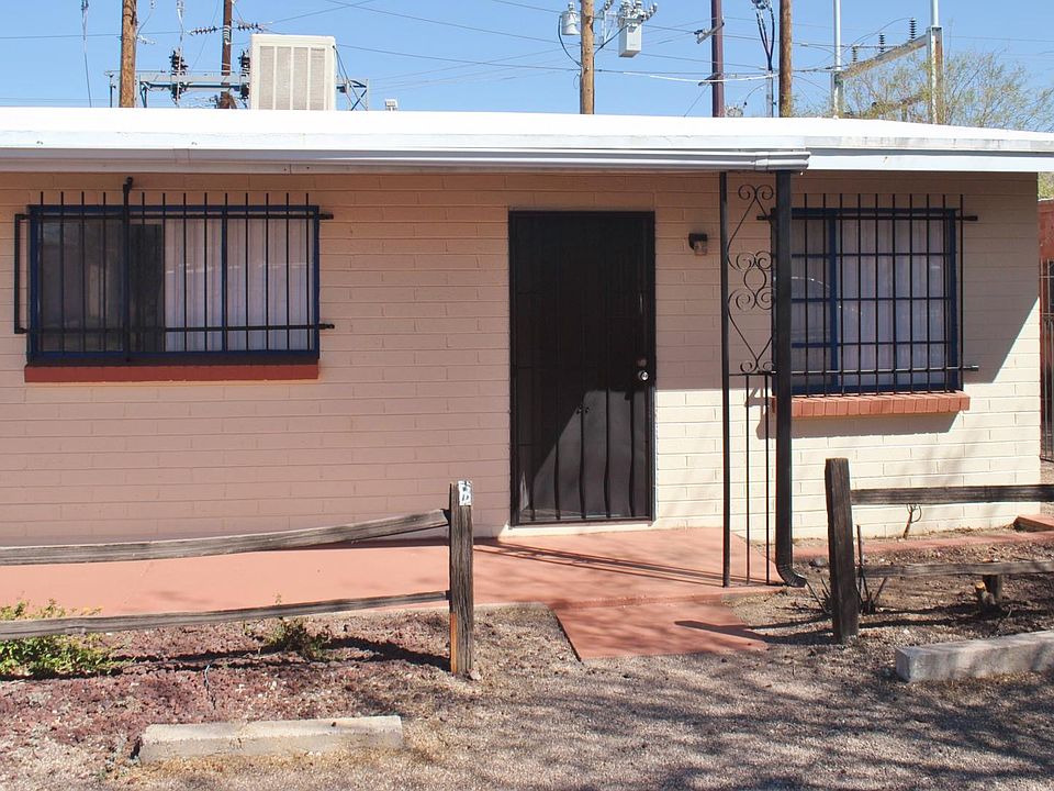 Front of the home with parking.