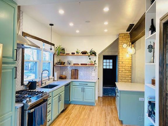 Kitchen with all new appliances. Looking back towards the front of the house.
