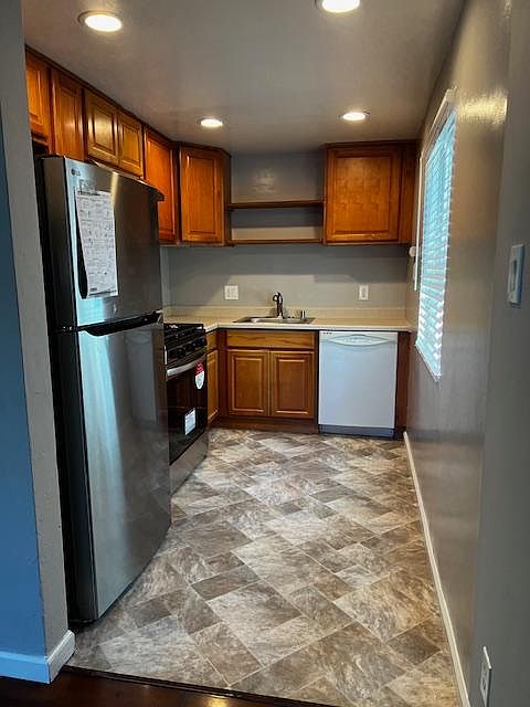 Kitchen- New Refrigerator and Gas Range