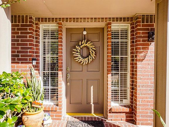 This covered front entrance is a good spot for receiving guests.