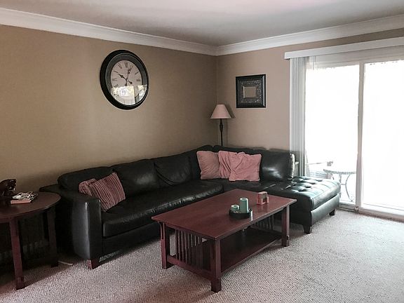 Awesome living room off the kitchen leads to private views o