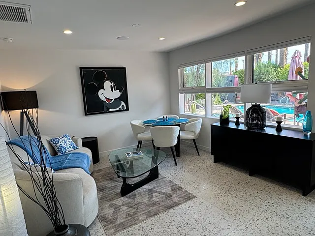 Den / Dining wide view to room and pool.
