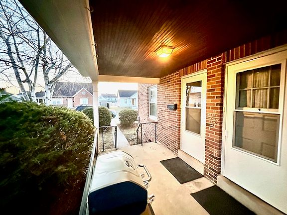 Covered Side Porch & Entrance 2nd Floor