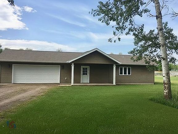 Driveway view of the house