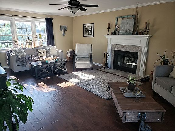 Living room w/wood fireplace