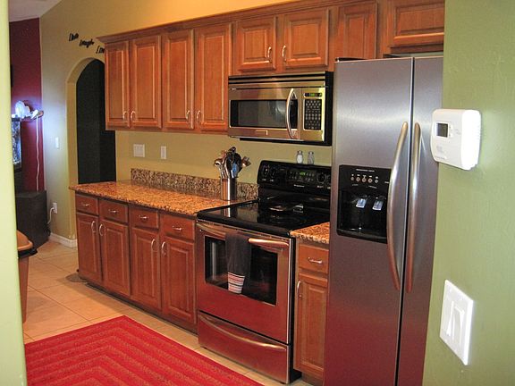 Wood cabinets and stainless appliances