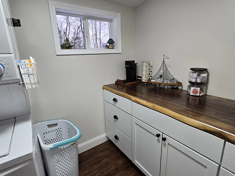 Pantry for storage, coffee, supplies, laundry w/ washer/dryer, broom, stepstool, hand towels, outdoor dish holder, etc.