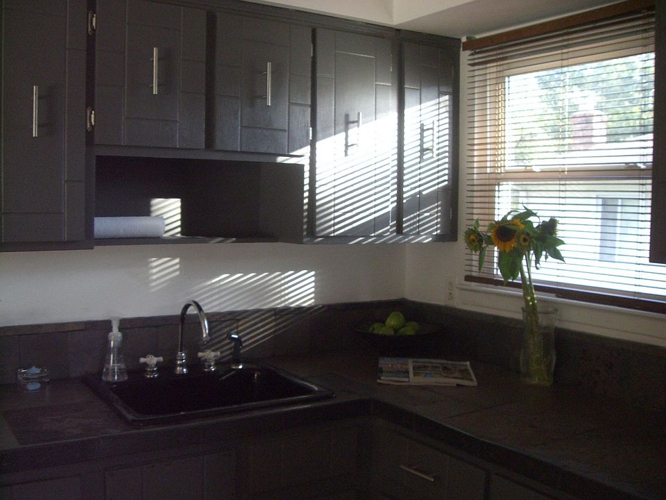 Updated kitchen with slate countertop. 