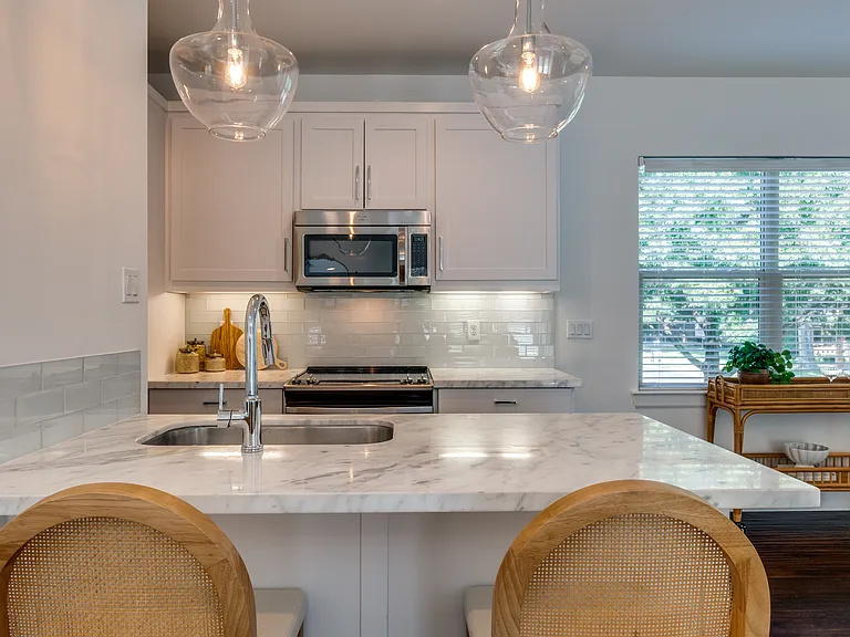 **Photos of Unit 1 to show lived in potential. Unit 5 is the same floorpan, finish outs and size.**