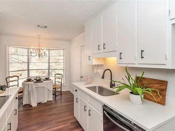 kitchen view to eat-in breakfast area 