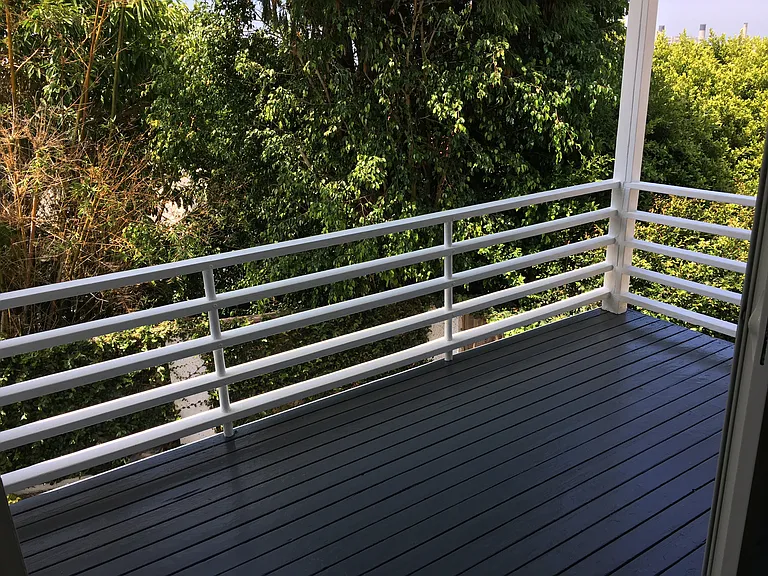 Ocean view. Rear balcony accessible from living room sliding door.