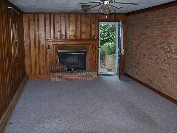 Den with Fireplace & Side En