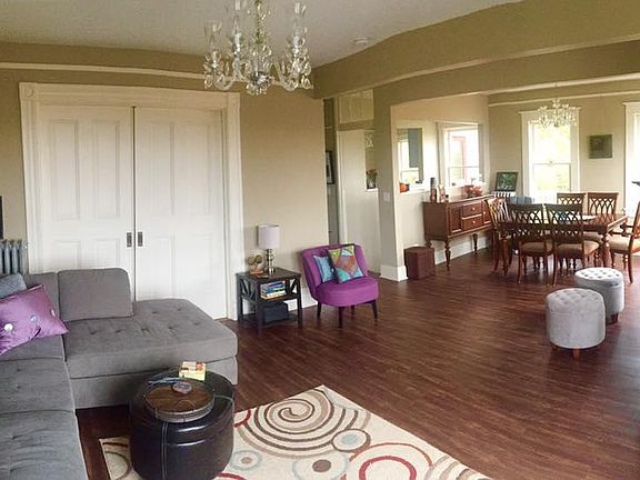 Open living / dining space with opening to kitchen. And pocket doors to main bedroom. This is where you'll soak in the Mt Hood sunrise view.