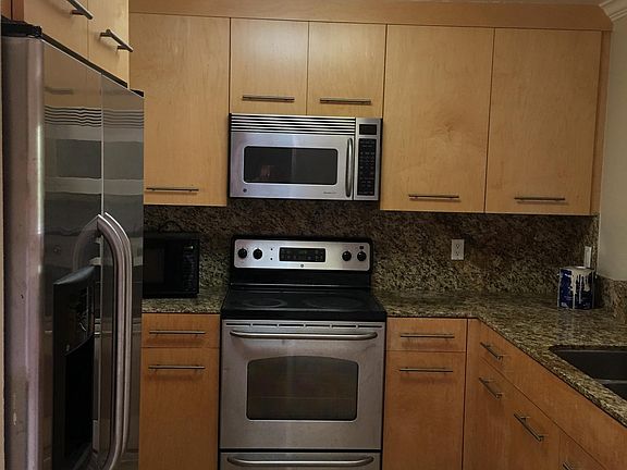2nd image of 7565 Charmant Dr Unit 308
