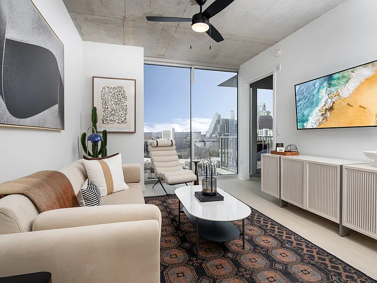 Lighted, modern ceiling fans in living rooms and bedrooms