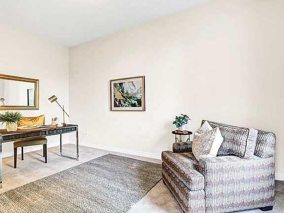 Private office is privately sited directly off of the front entry to the home.