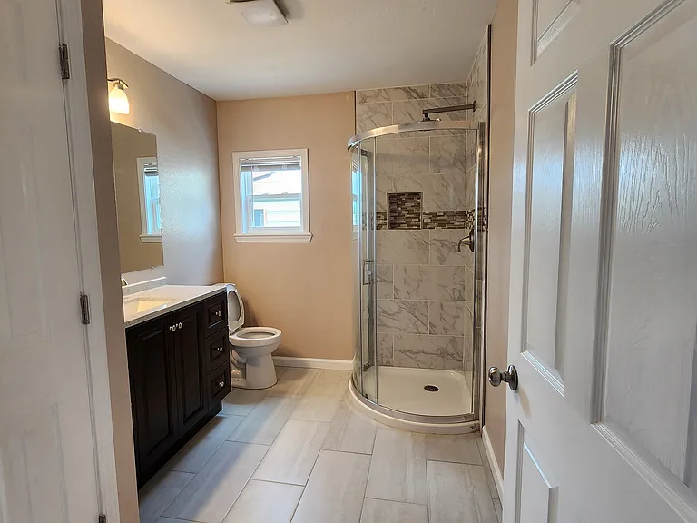 4114 Macarthur Dr — Photo 2