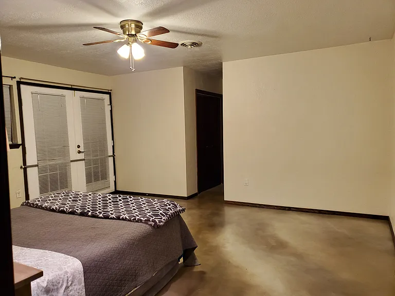 Master bedroom with French Doors.