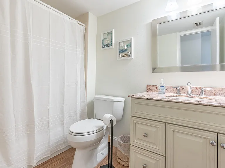 Guest bathroom with bathtub