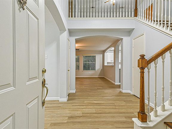Fabulous two story foyer to greet your guests.