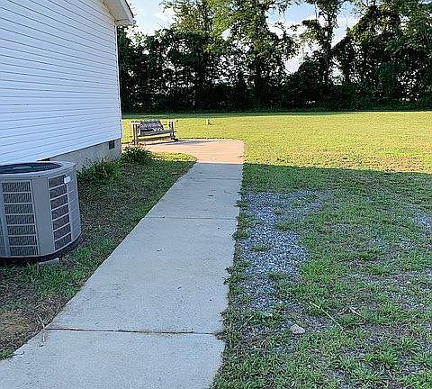 Sidewalk on side of house