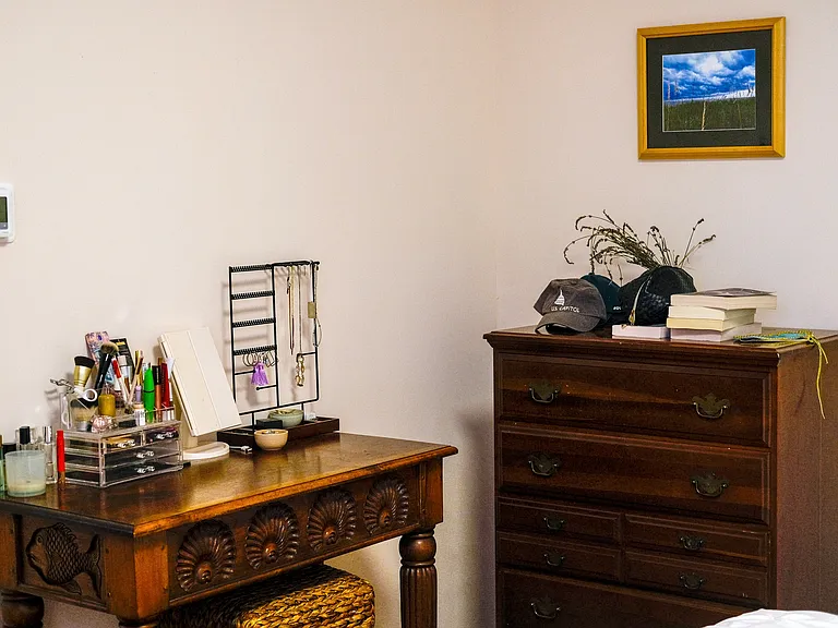 Vanity and dresser in bedroom