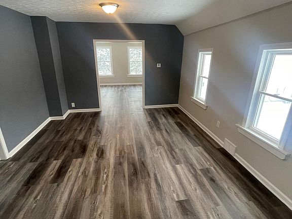 The kitchen connects to the large dining room