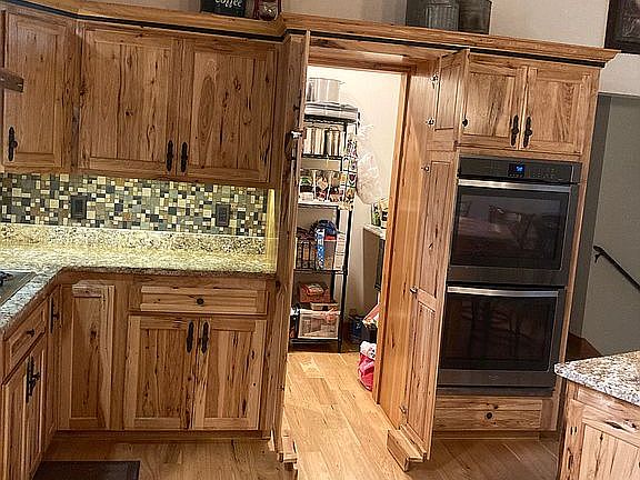 Hidden pantry door open