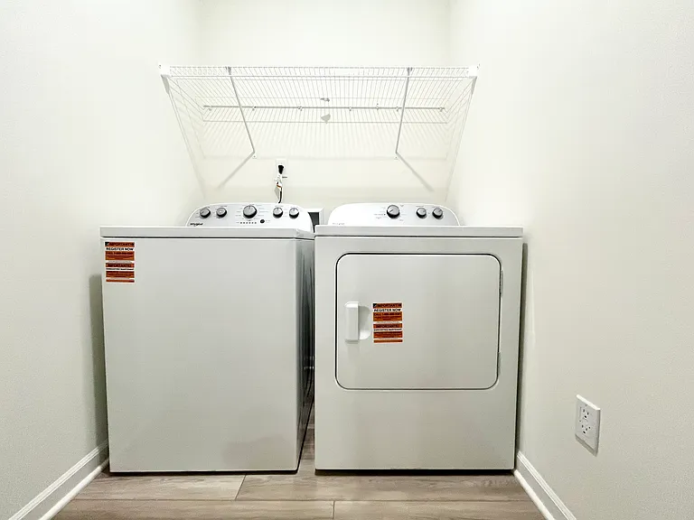 Laundry room with appliances included